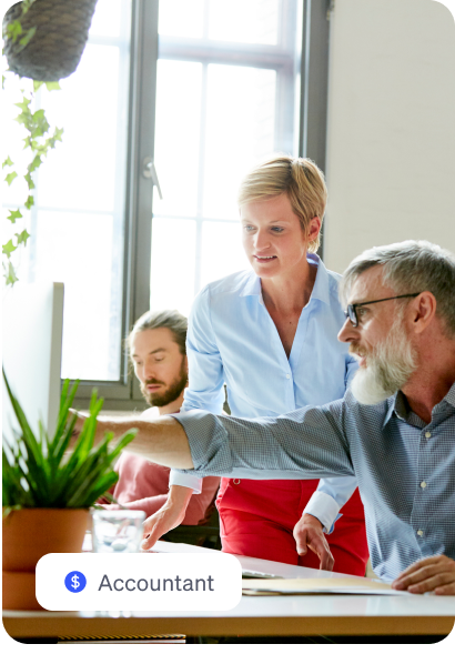 People looking at laptop
