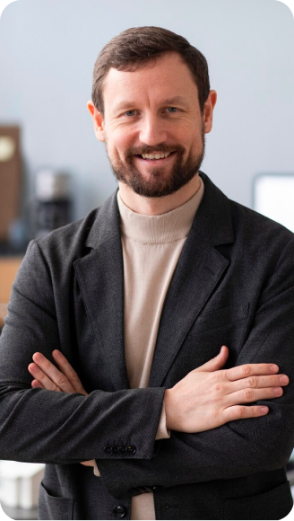 Man smiling with crossed arms