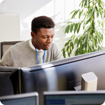 Man looking on computer