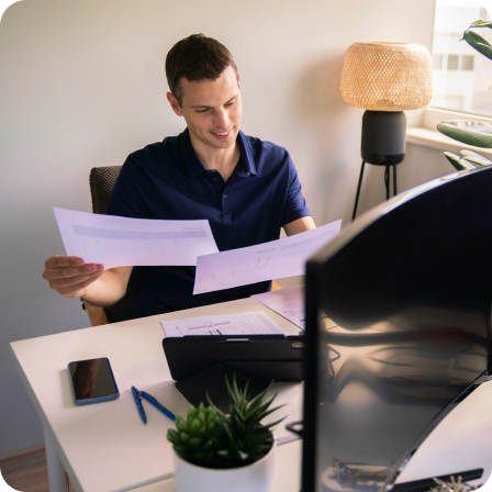 Man looking at papers