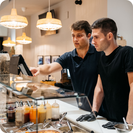 People looking at iPad